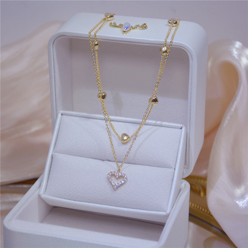Romance Brillante – Collar Doble Capa con Corazón y Detalles de Circonia 💍
